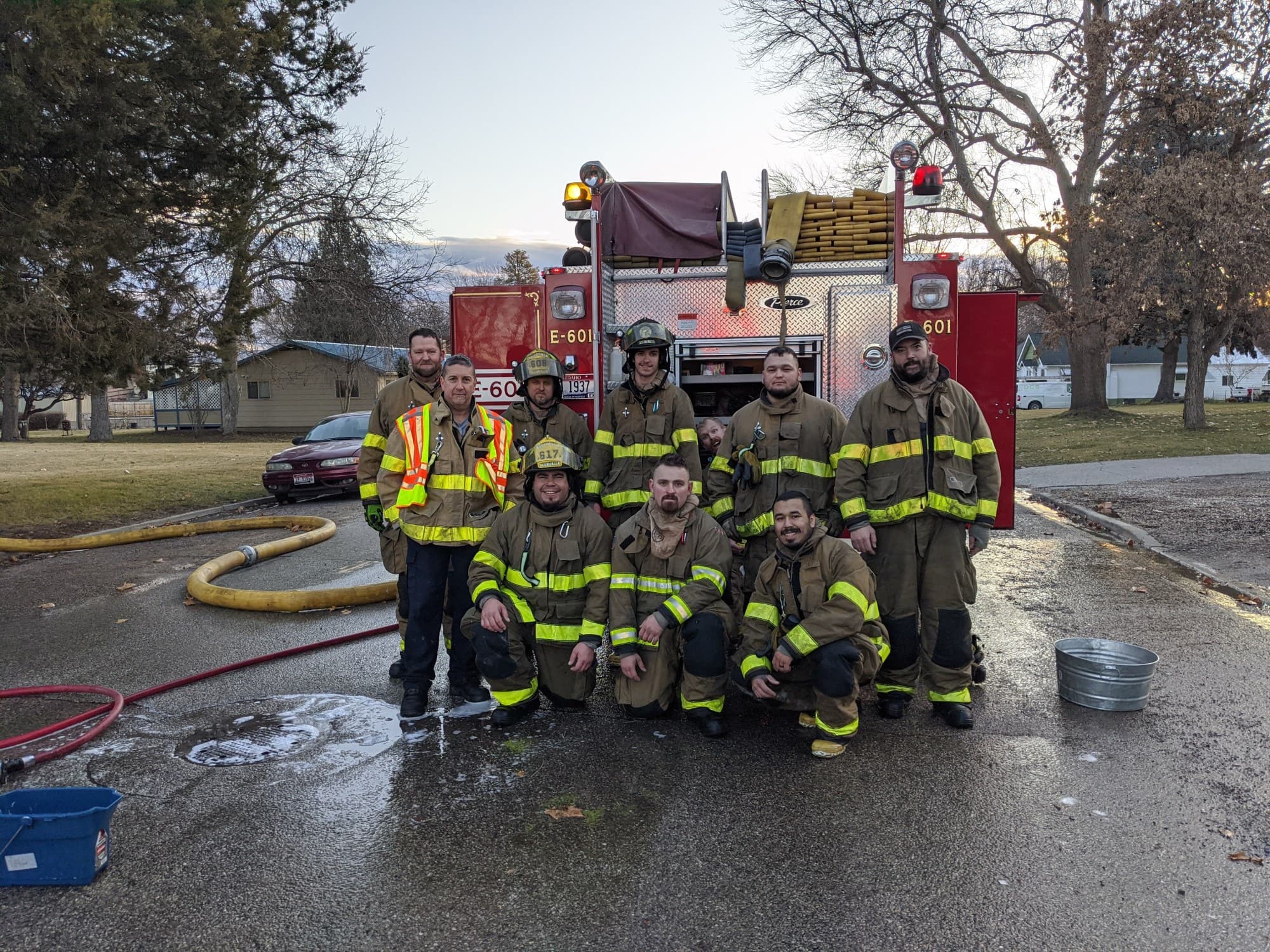 The Payette Fire Department crew in turnout gear outside the station