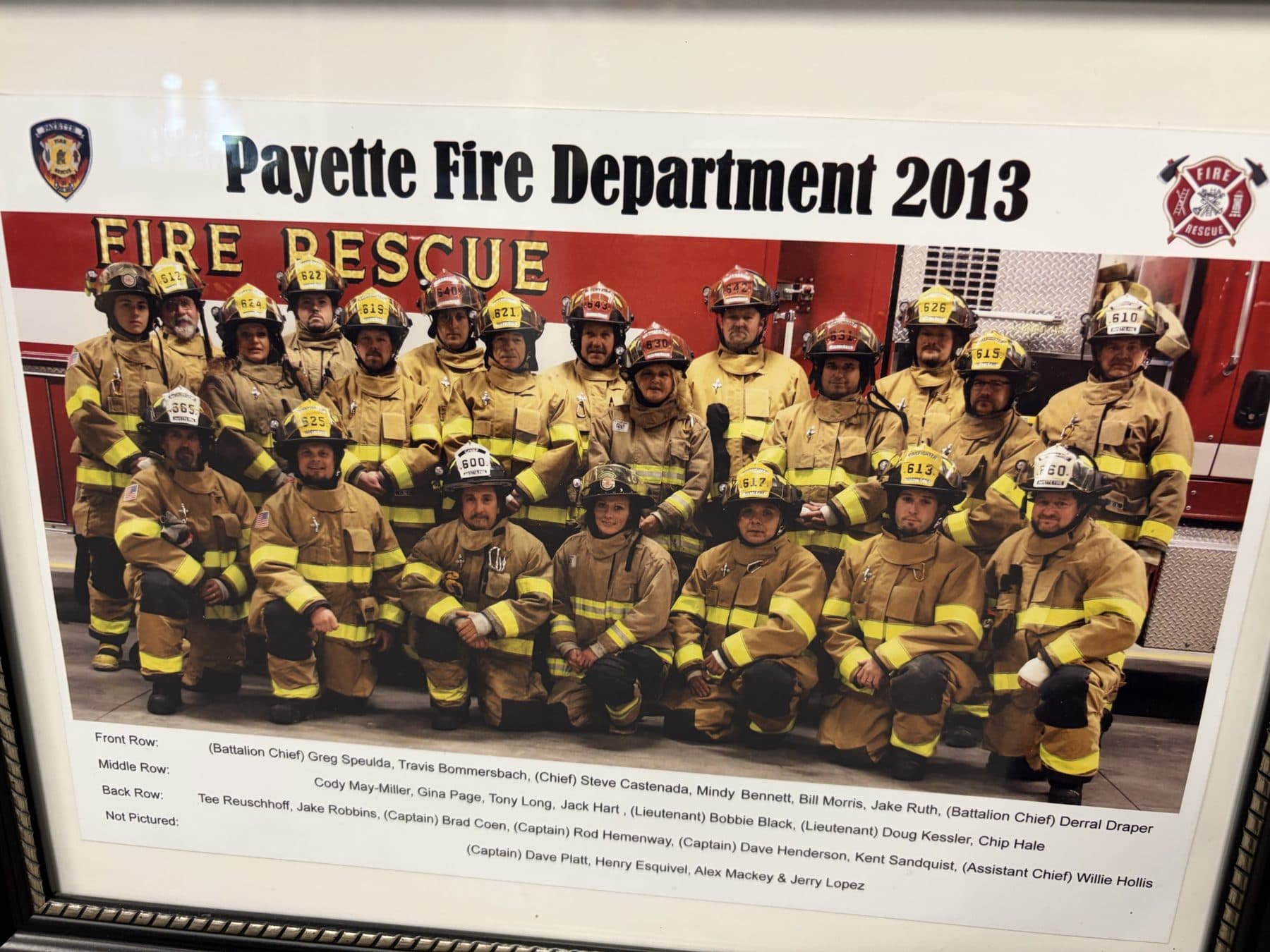 The Payette Fire Department crew in turnout gear in front of an engine
